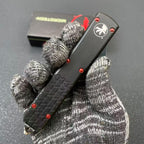 Aluminum Alloy UT85 Serrated Edge Tactical Knife 7CR14MOV